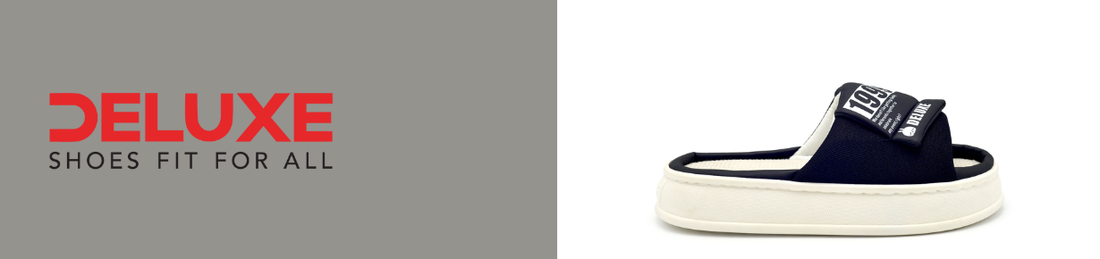 Men's black and white platform slide sandal by Deluxe with cushioned footbed, lightweight sole, and comfortable casual design